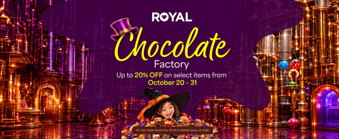 A banner featuring a candy factory and a girl in a witch costume on top of a mound of candies, with a purple splash and promotional text about the Royal Chocolate Factory sale from October 20 to 31.